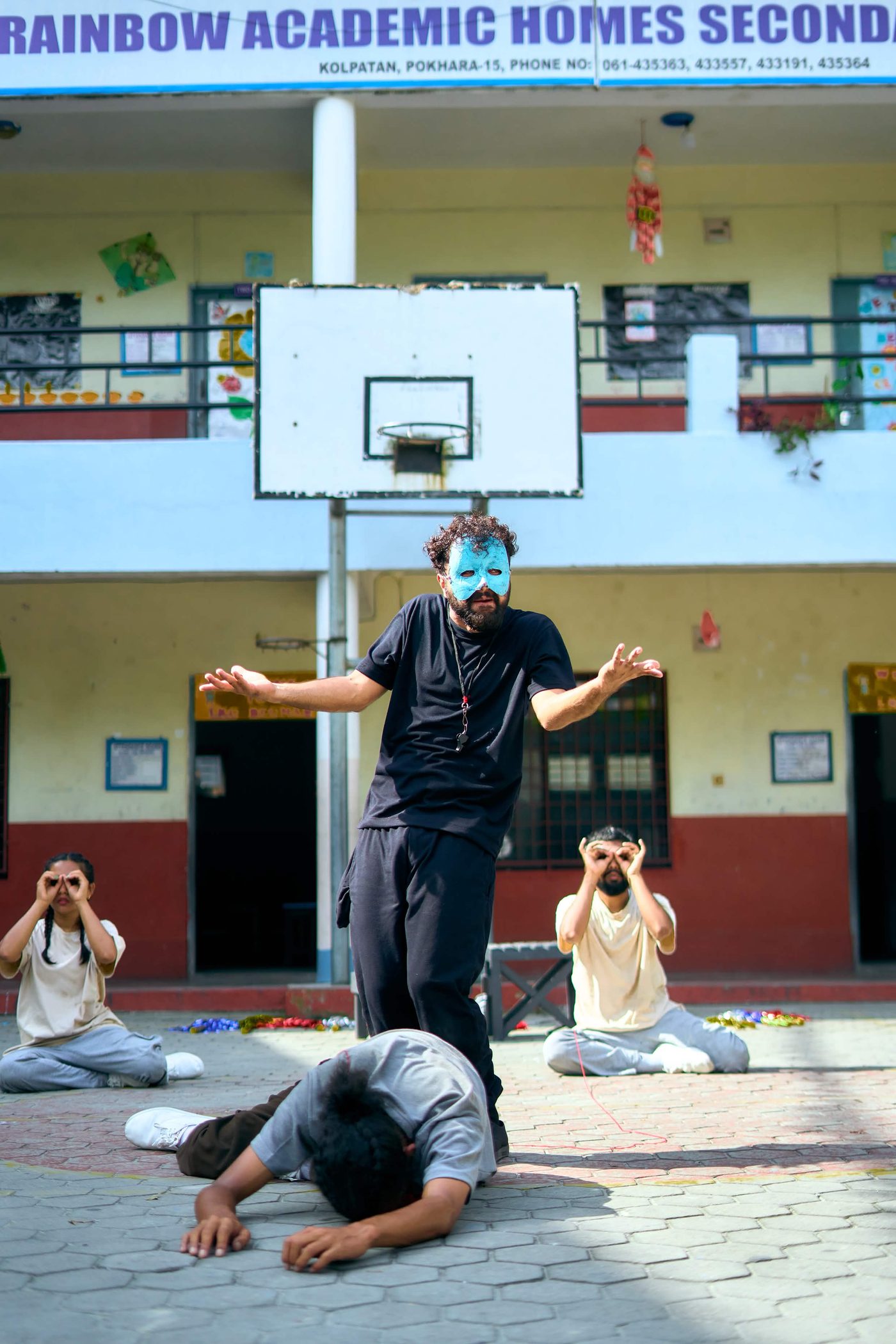 Ujjwal Raj Dhakal in a masked physical theater performance